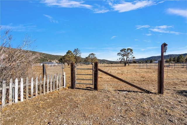 exterior space with a mountain view and a rural view