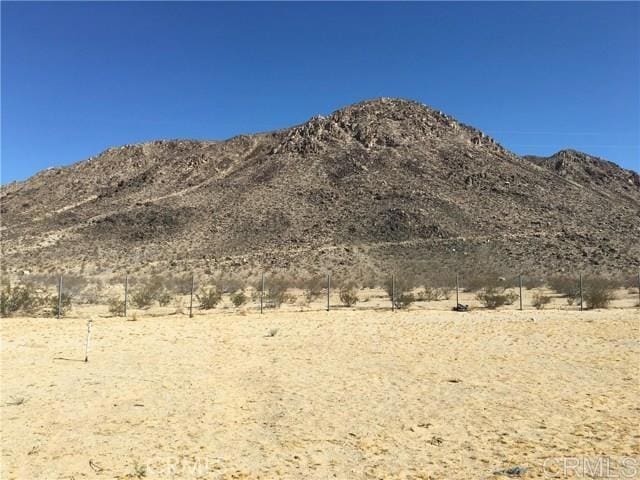 view of mountain feature featuring a rural view