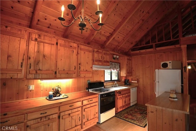 kitchen featuring wood ceiling, white appliances, pendant lighting, light hardwood / wood-style floors, and wood walls