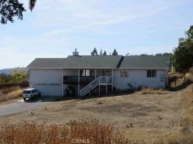 single story home featuring a porch