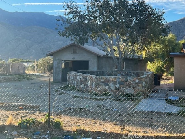 exterior space featuring a mountain view