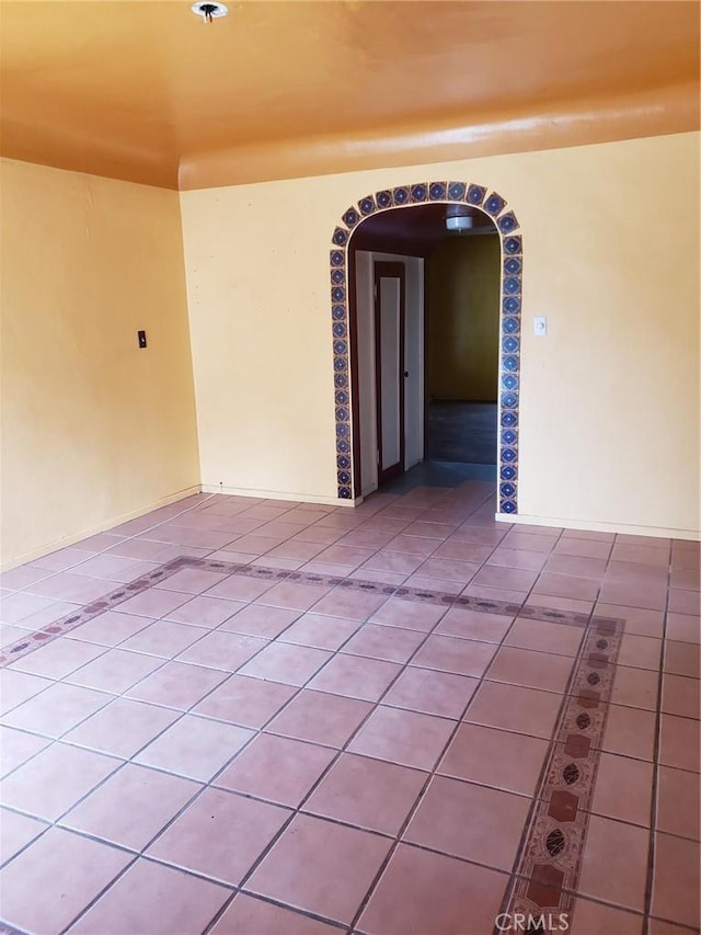 view of tiled spare room