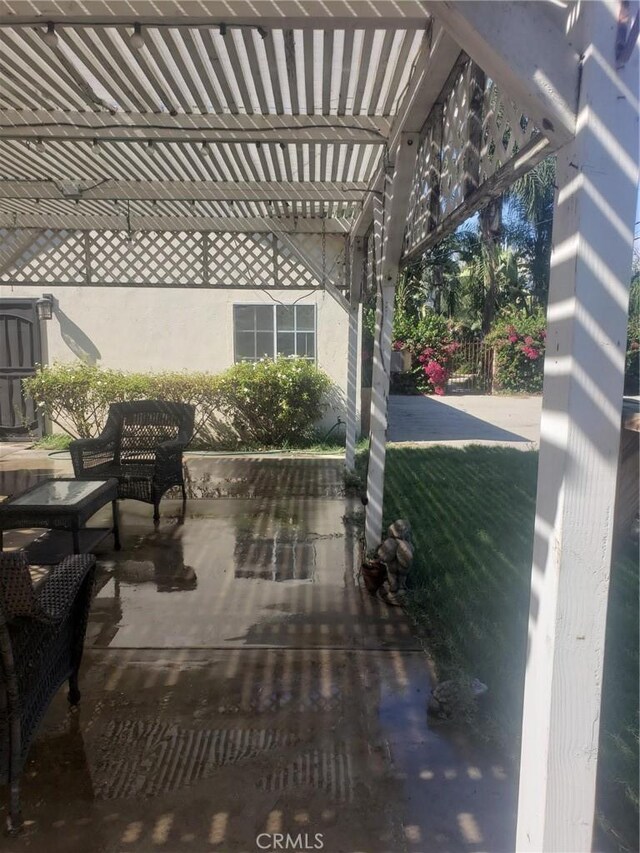 view of patio featuring a pergola