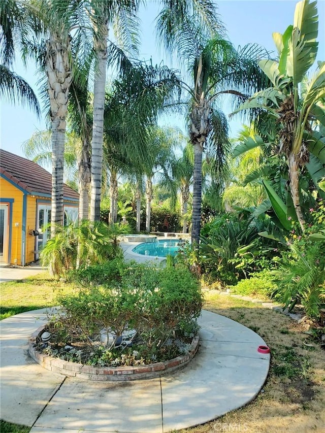 view of home's community with a pool