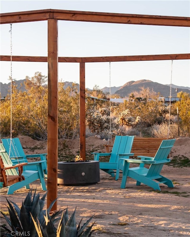 sunroom with a mountain view