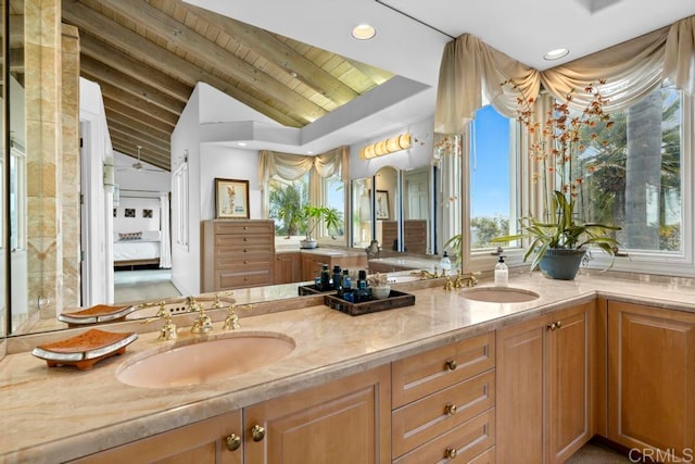 bathroom featuring vaulted ceiling with beams, vanity, and wood ceiling