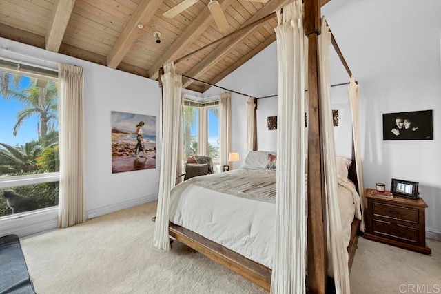 bedroom with light colored carpet, wood ceiling, and multiple windows