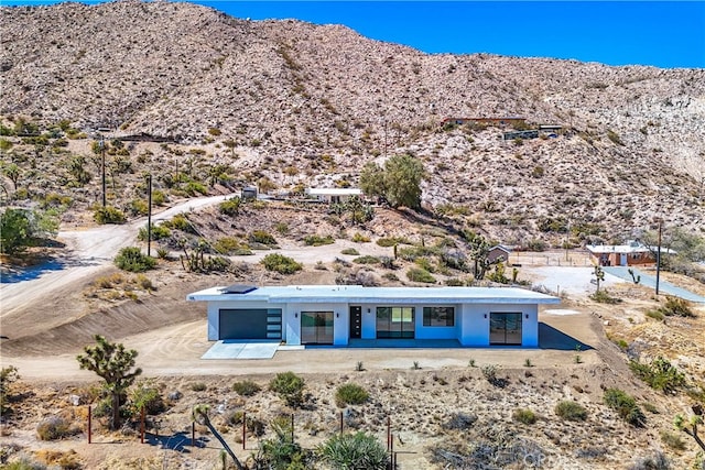 exterior space featuring a mountain view