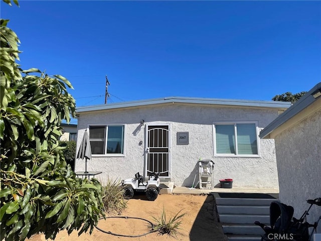 rear view of property with a patio