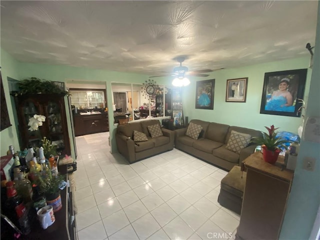2171 Pomona Ave, Costa Mesa, CA 92627 - living room with ceiling fan and light tile patterned floors