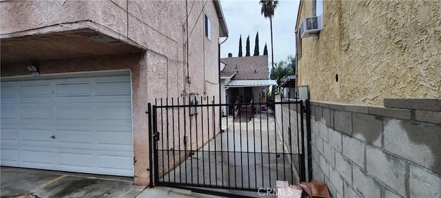 view of side of property featuring a garage