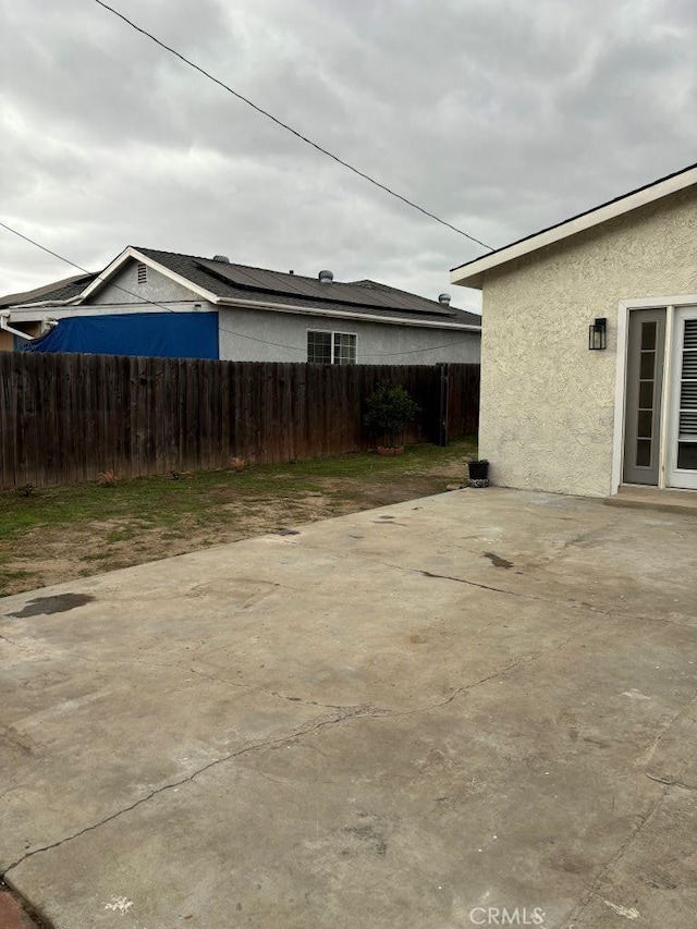 view of patio with fence