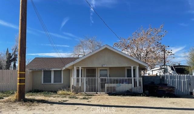 bungalow-style home with a porch