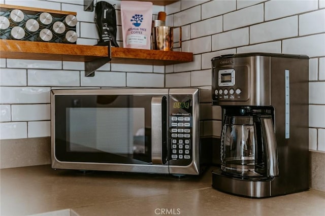 interior space featuring stainless steel appliances