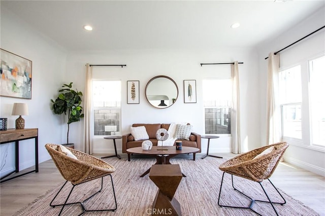 sitting room with light hardwood / wood-style floors