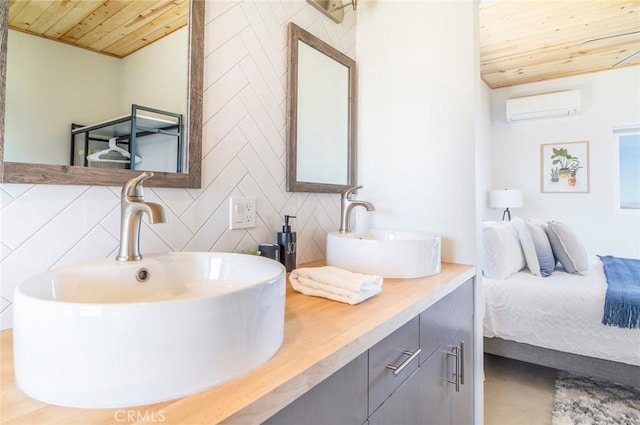 59149 Desert Gold Dr, Yucca Valley, CA 92284 - full bathroom with wood ceiling, a wall mounted air conditioner, backsplash, double vanity, and ensuite bathroom