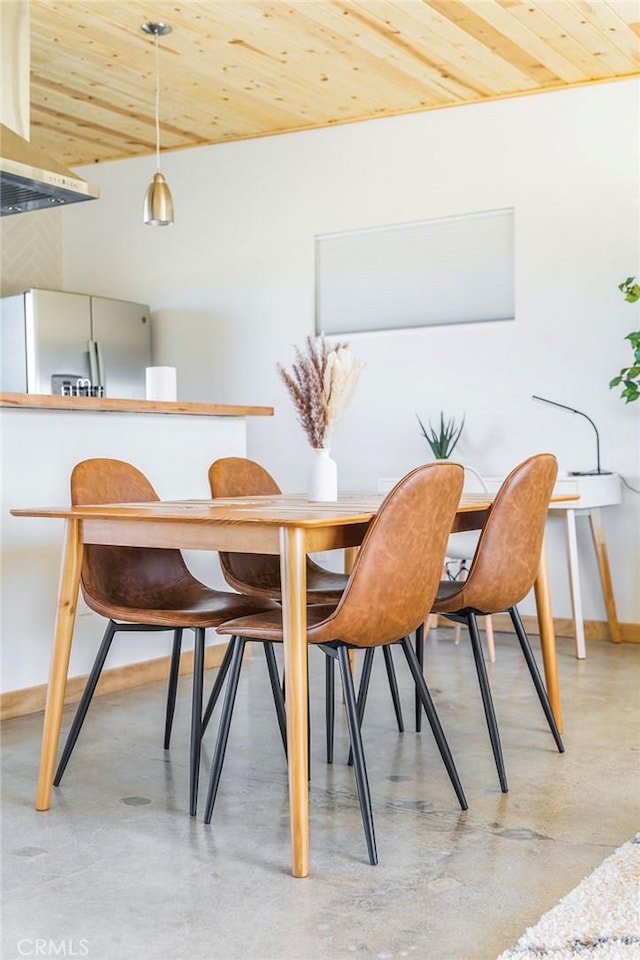 dining area with wooden ceiling