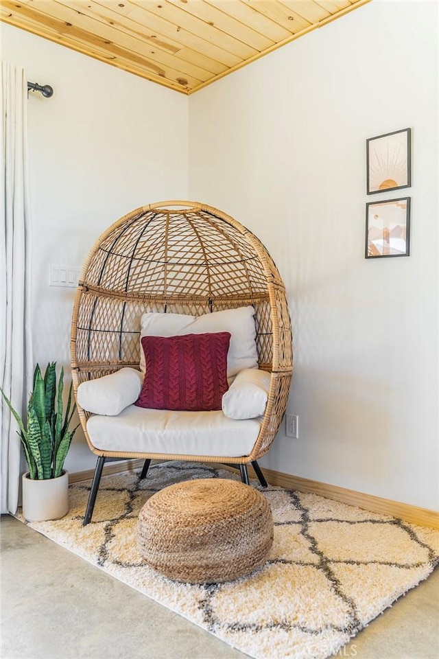 sitting room featuring wood ceiling