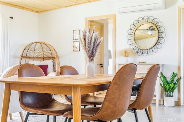 59149 Desert Gold Dr, Yucca Valley, CA 92284 - dining space featuring a wall unit AC and wooden ceiling