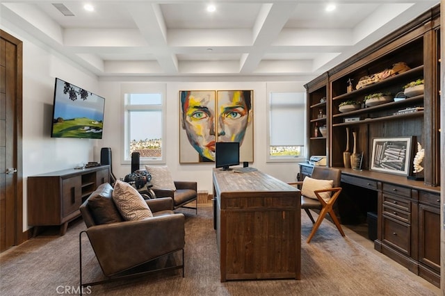 office space with carpet, beam ceiling, built in desk, and coffered ceiling