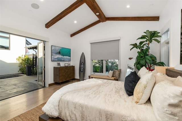 bedroom featuring vaulted ceiling with beams, wood-type flooring, and access to outside