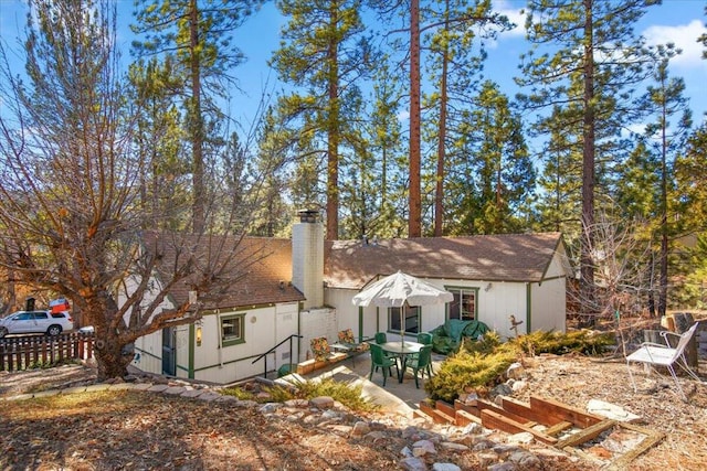 back of property featuring a patio area