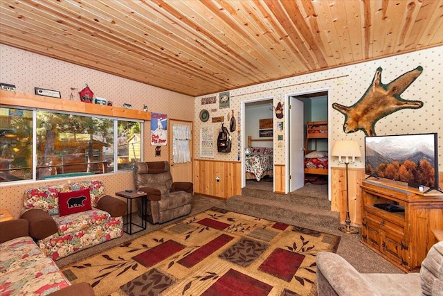 carpeted living room with wood ceiling