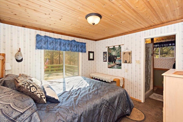 bedroom with wood ceiling, carpet, and multiple windows