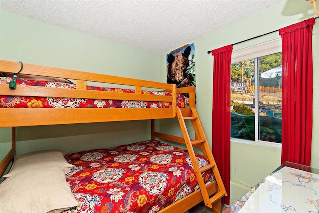 bedroom featuring a textured ceiling