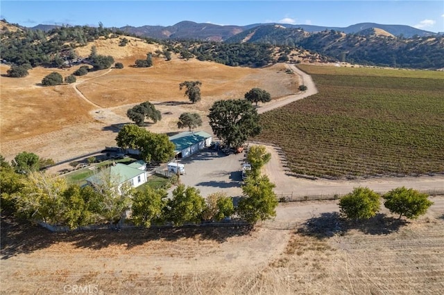 aerial view featuring a rural view and a mountain view