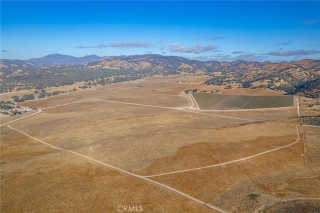 drone / aerial view featuring a mountain view