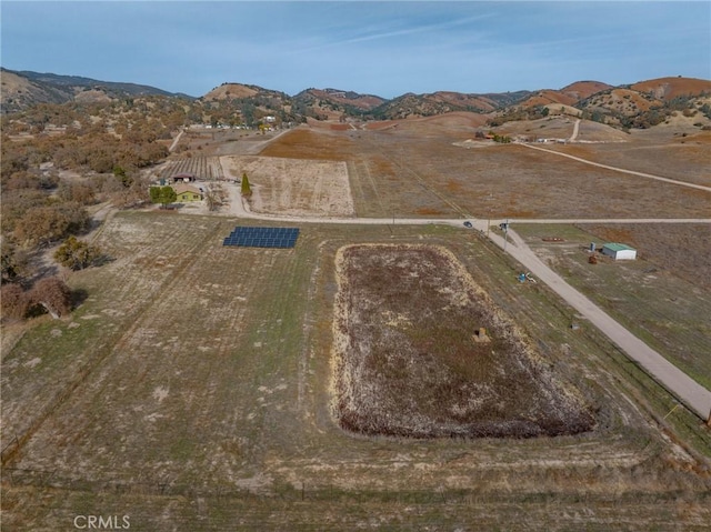 drone / aerial view with a rural view and a mountain view