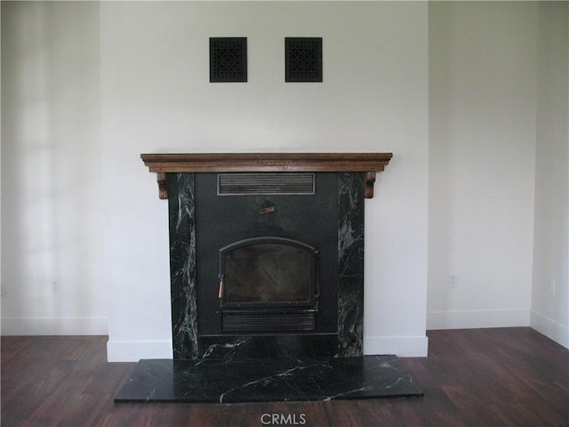 interior details featuring wood-type flooring