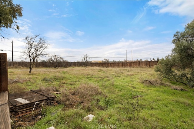 view of yard with a rural view