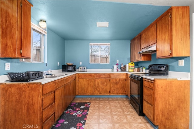 kitchen with sink and black appliances