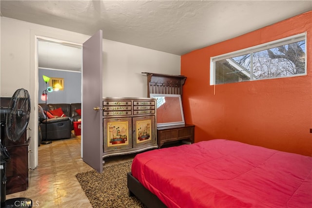 bedroom with a textured ceiling