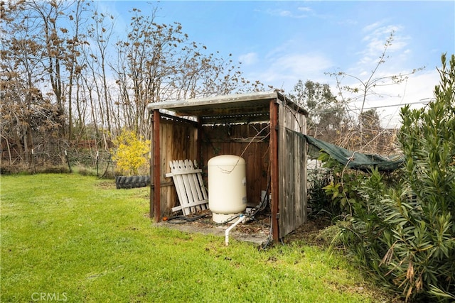 view of outdoor structure with a yard