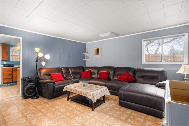 living room with crown molding