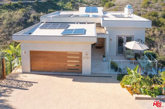 contemporary house featuring solar panels