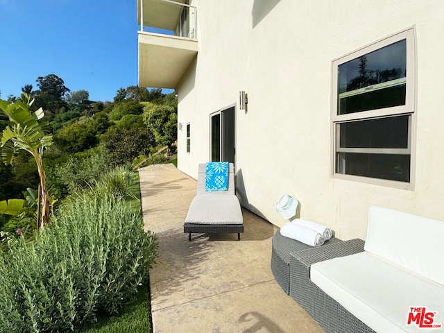 view of patio / terrace featuring a balcony