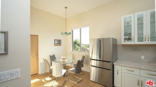 dining room with light wood-type flooring