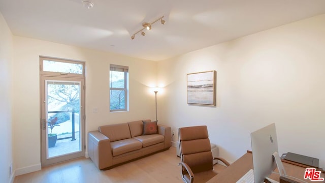 living room with light hardwood / wood-style floors