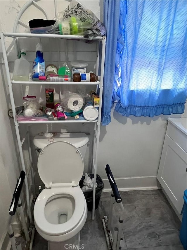 bathroom with vanity and toilet