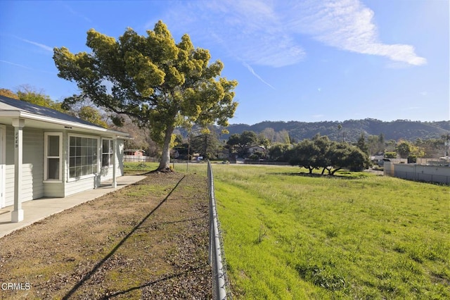 view of yard with a mountain view