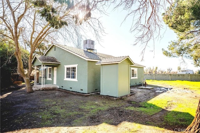 back of property with cooling unit