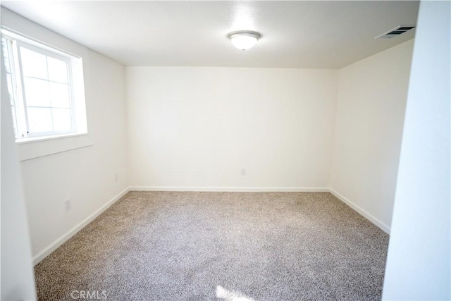 empty room with carpet floors