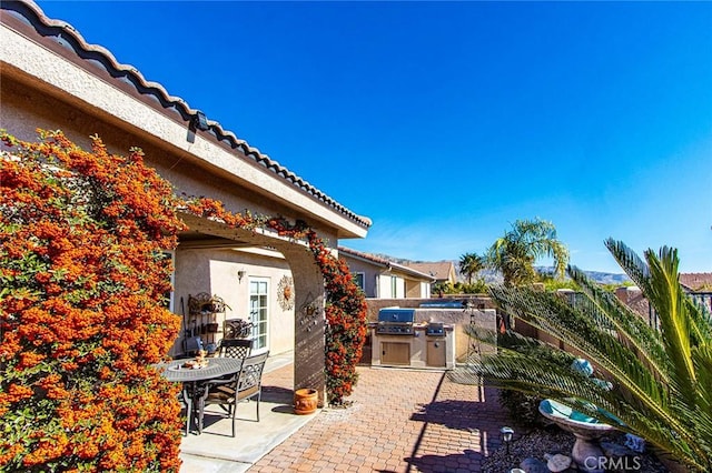 view of patio featuring area for grilling