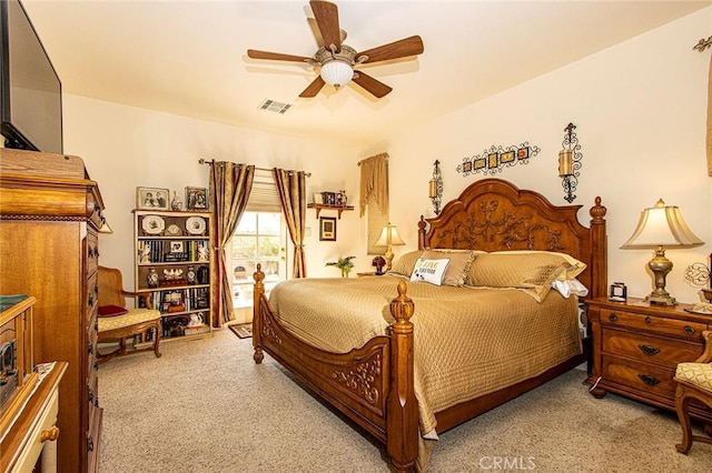 bedroom featuring ceiling fan and light colored carpet