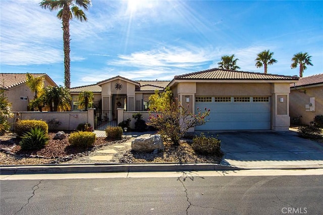 view of front of property with a garage