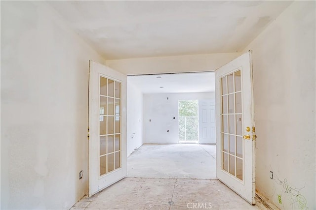 corridor featuring french doors